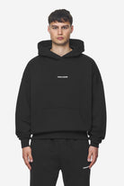 Pegador Logo Boxy Hoodie Washed Black White Gum Hauptansicht aus der Next Wave Kollektion für Herren