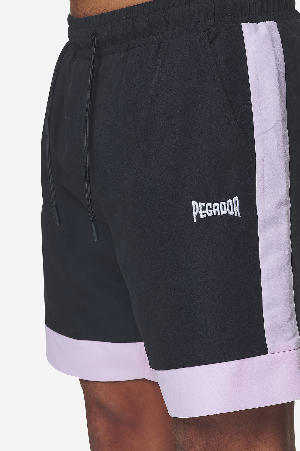 Pegador Vicente Swim Shorts Black Bubblegum Detailshot aus der Next Wave Kollektion für Herren