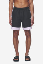 Pegador Vicente Swim Shorts Black Bubblegum Hauptansicht aus der Next Wave Kollektion für Herren