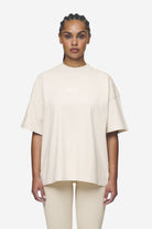 Pegador Arendal Logo Heavy Oversized Tee Washed Coast Sand White Gegenansicht aus der Next Wave Kollektion für DaHerren