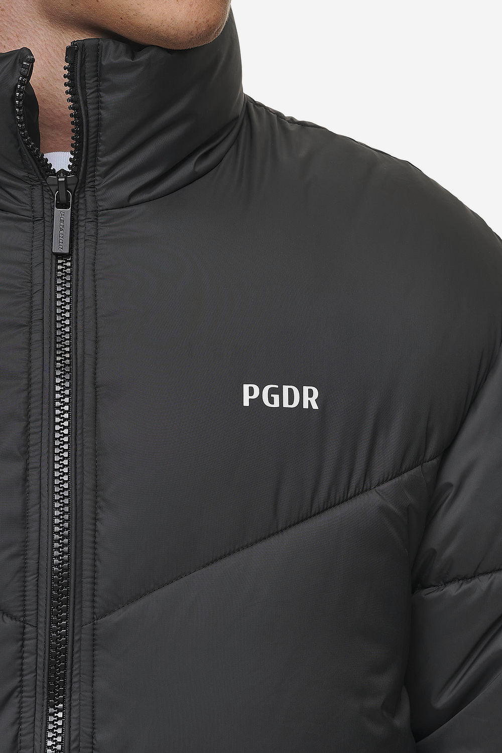 Pegador Anando Puffer Jacket Black Detailshot aus der PEGADOR® Outerwear 24 Kollektion für Herren